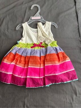 Sleeveless Cream Top Dress with Bright Multicolor Striped Skirt